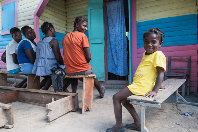 Pregnant women gather for a rural mobile clinic in Haiti; photo by Cheryl Hanna-Truscott