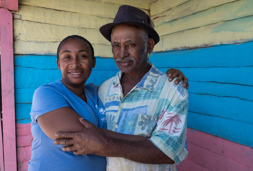 a midwife and her father at a Haitian rural mobile clinic; photo by Cheryl Hanna-Truscott
